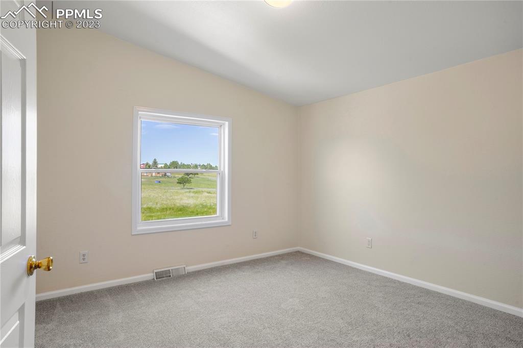 12825 Mc Cune Road Elbert, CO 80106 - Photo 35 of 50 an empty room with a window