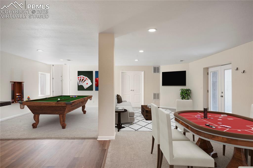 12825 Mc Cune Road Elbert, CO 80106 - Photo 41 of 50 a room with furniture pool table and flat screen tv