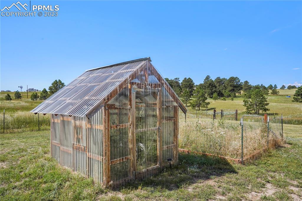 12825 Mc Cune Road Elbert, CO 80106 - Photo 49 of 50 a view of a house with a yard