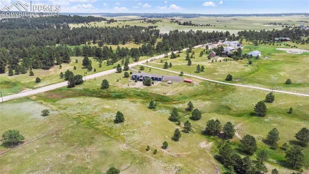 12825 Mc Cune Road Elbert, CO 80106 - Photo 6 of 50 a view of a lake in middle of the town