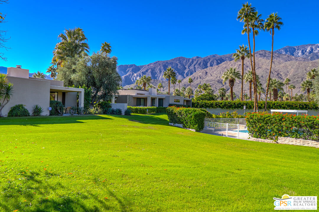 1142 East La Jolla Road Palm Springs, CA 92264 - Photo 31 of 35 a view of a house with a yard