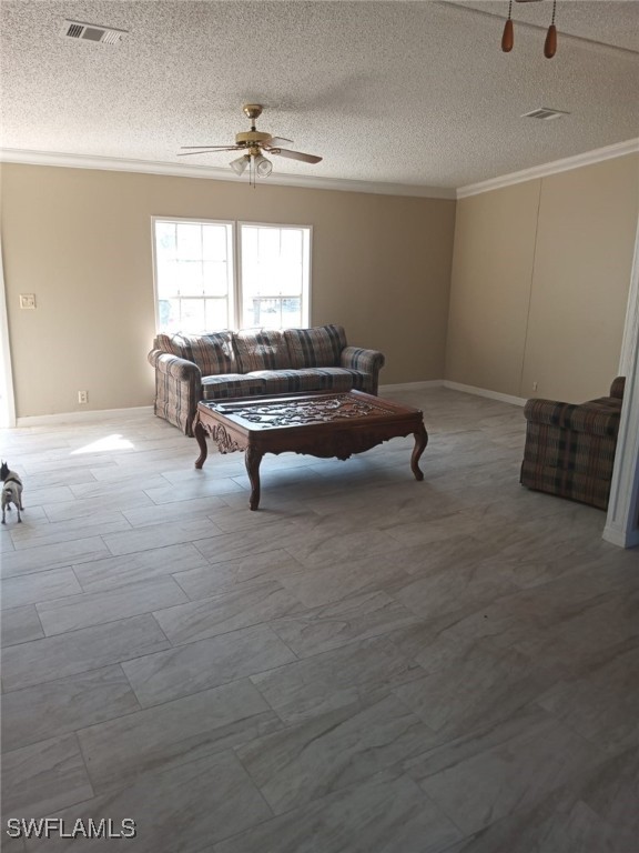 618 Hunting Club Avenue Clewiston, FL 33440 - Photo 11 of 32 a living room with furniture and a large window