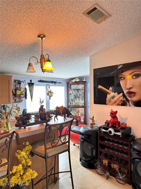 618 Hunting Club Avenue Clewiston, FL 33440 - Photo 16 of 32 a living room with furniture and a flat screen tv