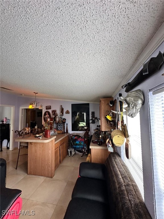 618 Hunting Club Avenue Clewiston, FL 33440 - Photo 19 of 32 a living room with furniture and a flat screen tv