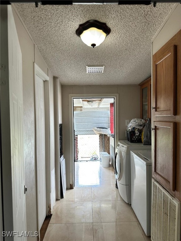 618 Hunting Club Avenue Clewiston, FL 33440 - Photo 28 of 32 a kitchen with a refrigerator and a stove