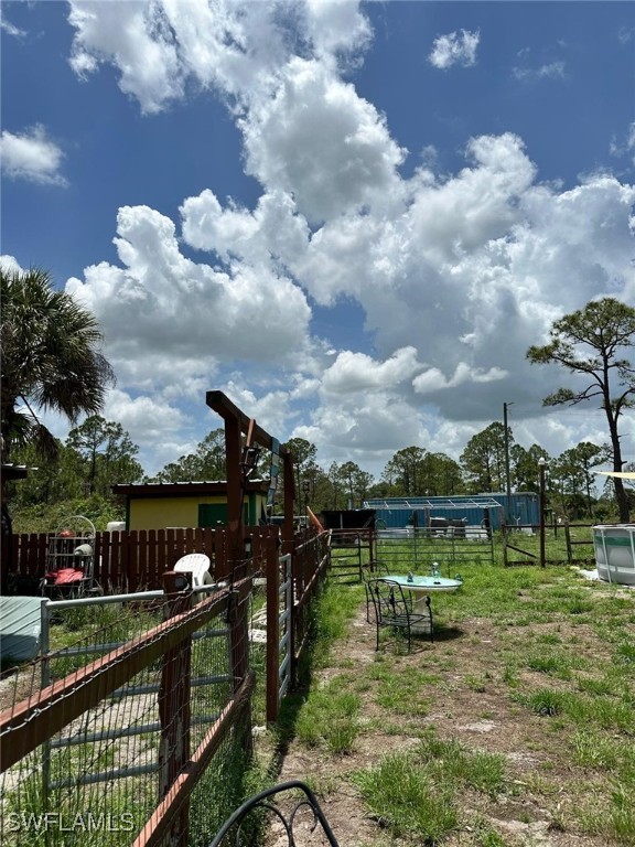 618 Hunting Club Avenue Clewiston, FL 33440 - Photo 32 of 32 a garden view with a lake view