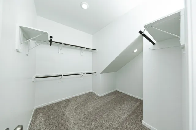 a view of a room with racks on the wall