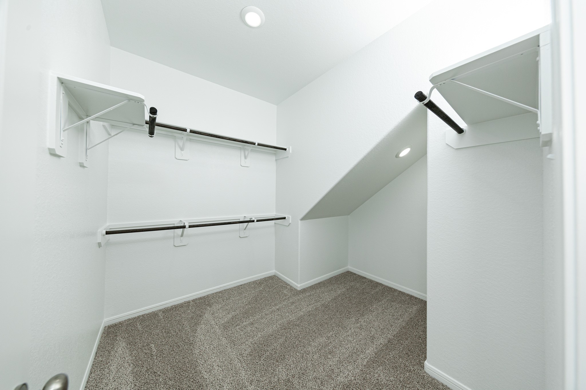 3058 Nickell Back Drive Conroe, TX 77301 - Photo 11 of 25 a view of a room with racks on the wall