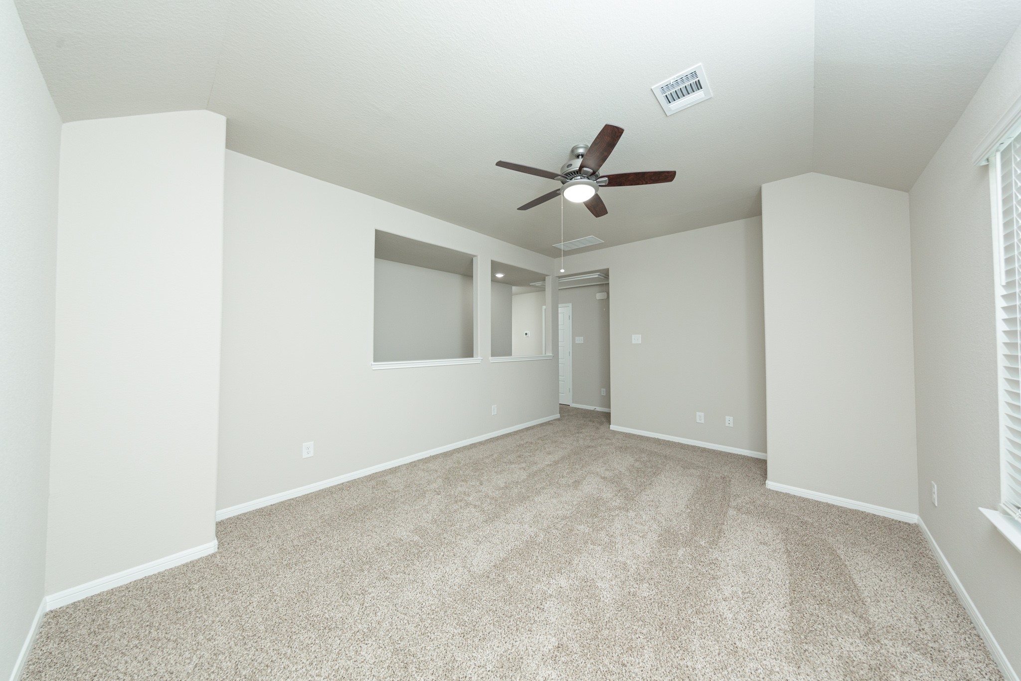 3058 Nickell Back Drive Conroe, TX 77301 - Photo 14 of 25 a view of an empty room with a window