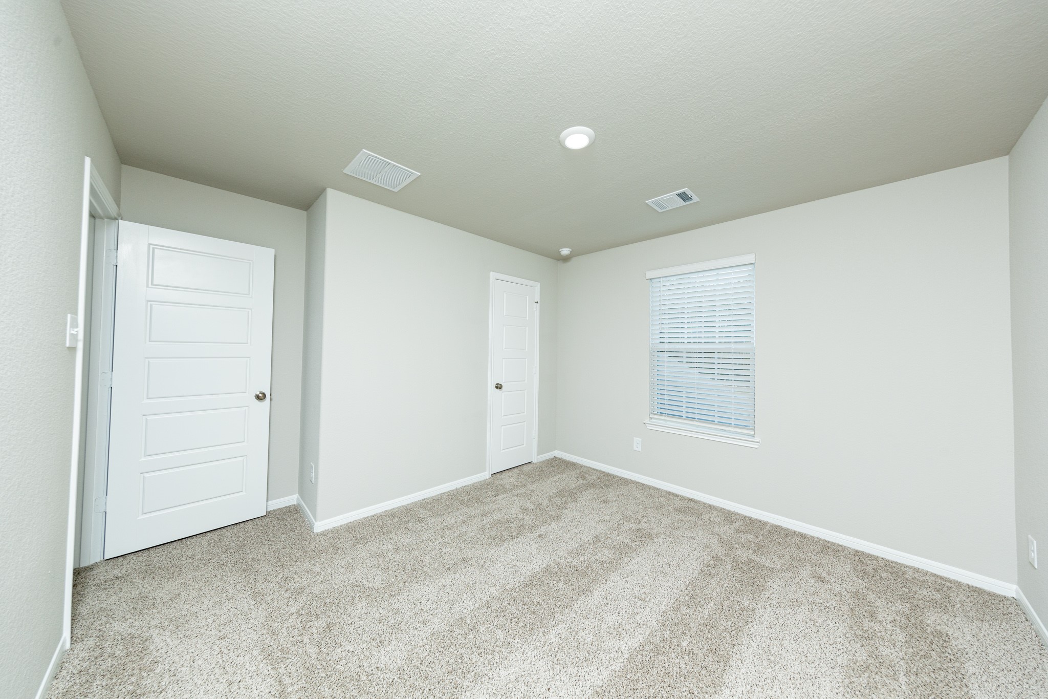 3058 Nickell Back Drive Conroe, TX 77301 - Photo 18 of 25 a view of an empty room with a window