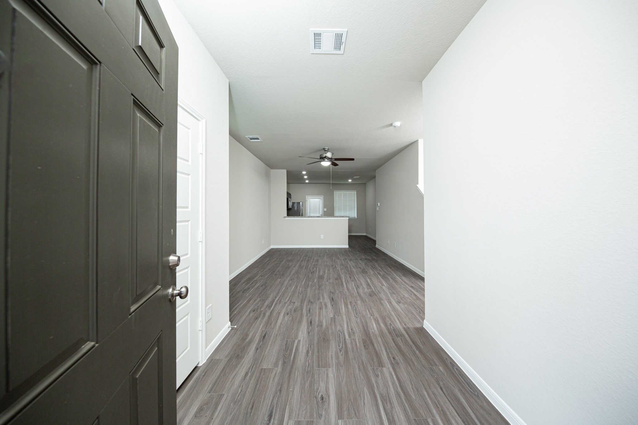 3058 Nickell Back Drive Conroe, TX 77301 - Photo 4 of 25 a view of empty room with wooden floor