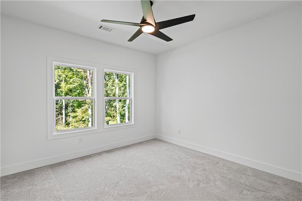 5115 Travers Lane Cumming, GA 30040 - Photo 20 of 32 an empty room with a window