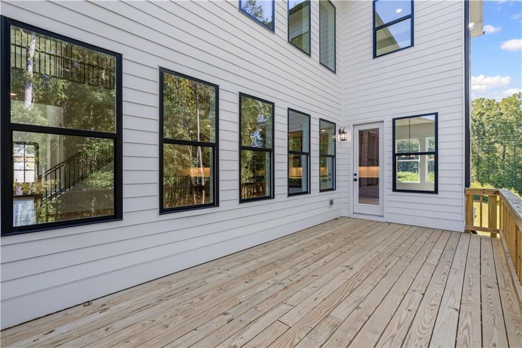 5115 Travers Lane Cumming, GA 30040 - Photo 27 of 32 a view of a house with a porch