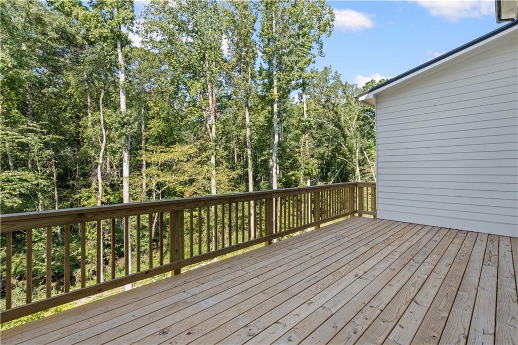 5115 Travers Lane Cumming, GA 30040 - Photo 28 of 32 a view of balcony with wooden floor