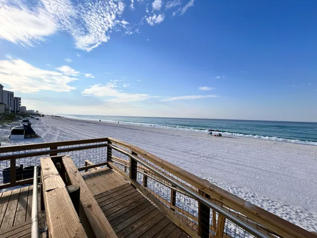 an outdoor view of the patio and swimming pool