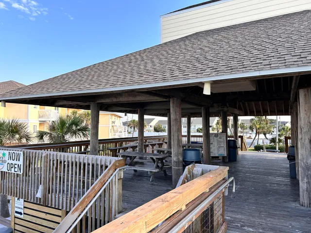 a view of a swimming pool with an outdoor space and seating area