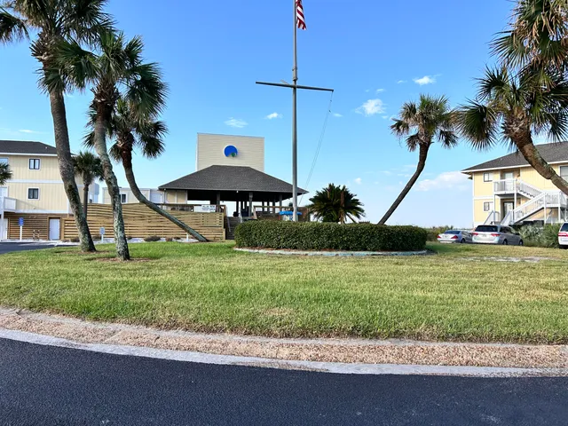 a view of a lake with tall buildings