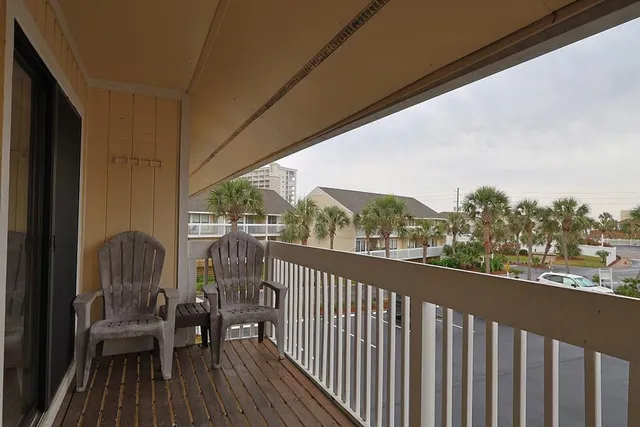 a view of a balcony with city view