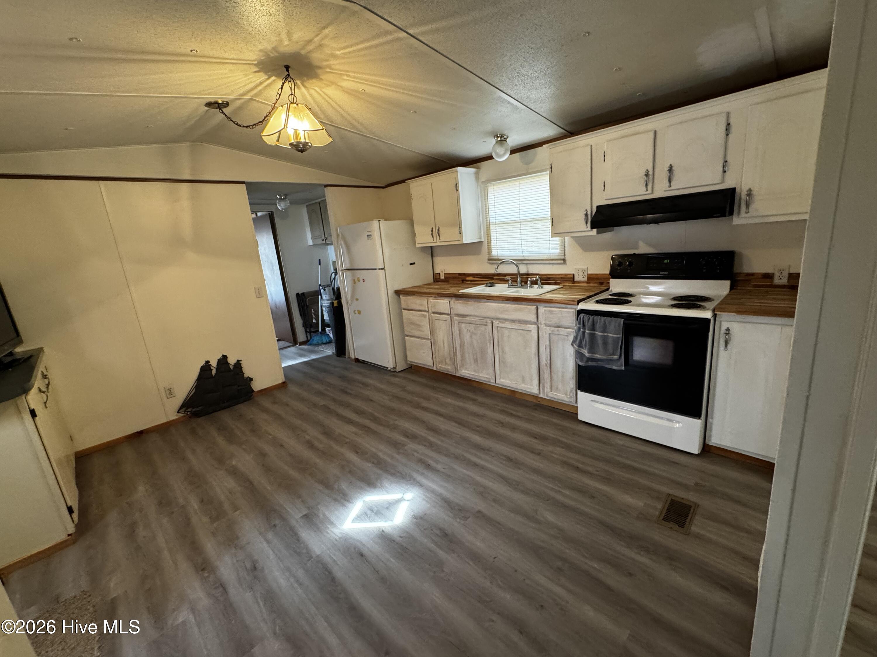 8103 Mackeys Road Roper, NC 27970 - Photo 4 of 26 Kitchen with updated plank flooring
