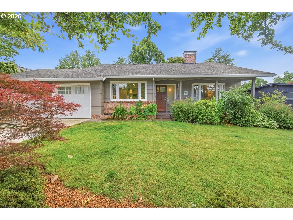 3130 Southwest 116th Avenue Beaverton, OR 97005 - Photo 39 of 44 a view of a house with garden and yard