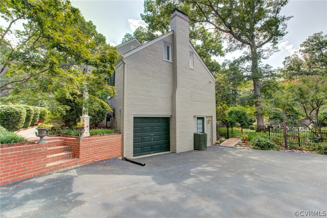 8901 Tolman Road Henrico, VA 23229 - Photo 38 of 50 Driveway on the side of the house with plenty of p