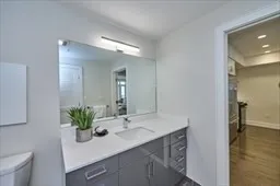 a bathroom with a toilet and a sink