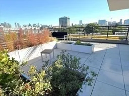 a view of a swimming pool with an ocean view