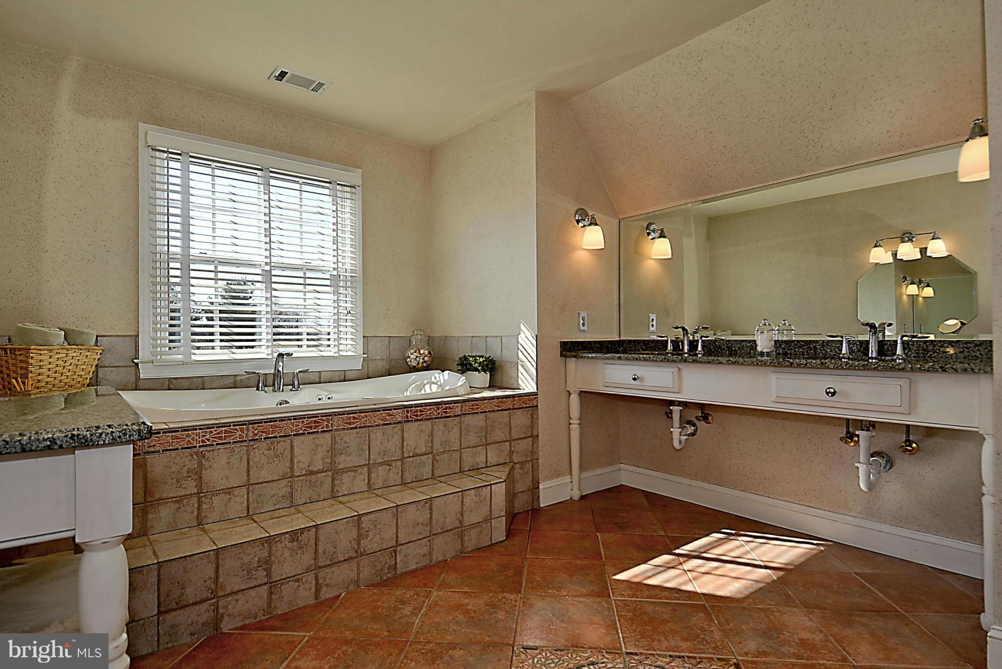 22710 Wildcat Road Germantown, MD 20876 - Photo 14 of 30 Soaking Tub with jets and tile floor