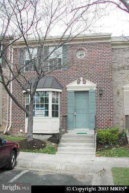 3623 Banquo Drive, Unit 62 Silver Spring, MD 20906 - Photo 1 of 5 a front view of a house with a garden