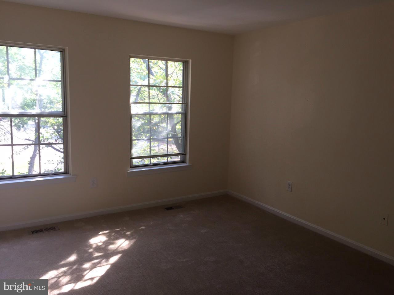 3623 Banquo Drive, Unit 62 Silver Spring, MD 20906 - Photo 4 of 5 an empty room with a window