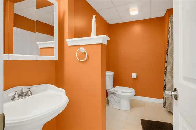 a bathroom with a sink and a toilet