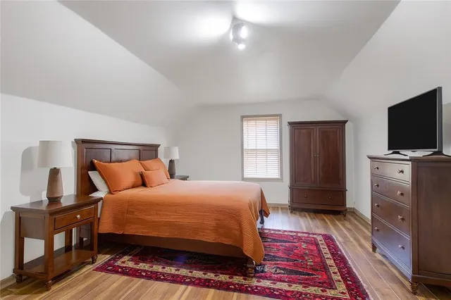 a bedroom with a bed and furniture