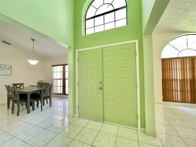 a view of a dining area with entryway