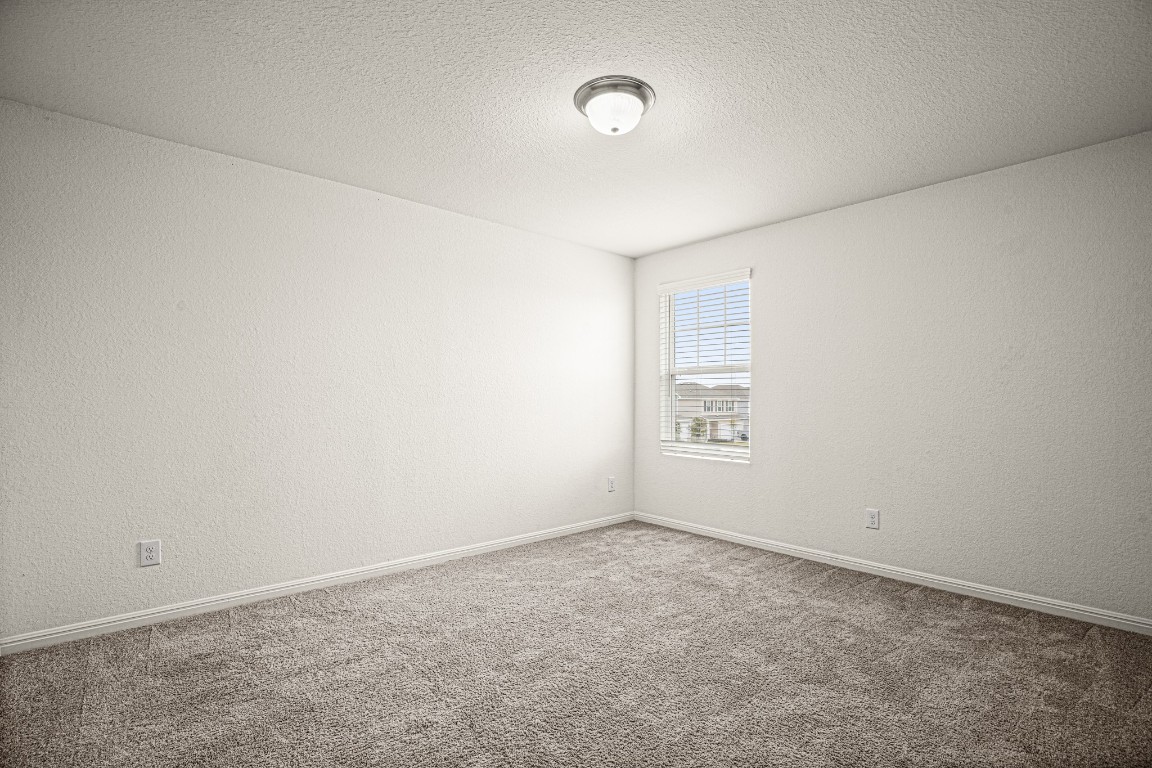 109 Gray Fox Loop Hutto, TX 78634 - Photo 19 of 28 Front bedroom
