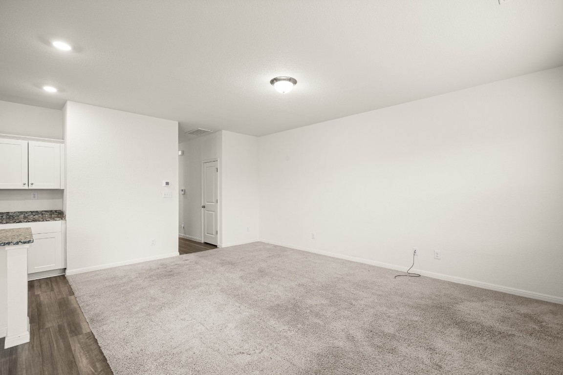 109 Gray Fox Loop Hutto, TX 78634 - Photo 3 of 28 Unfurnished living room with baseboards