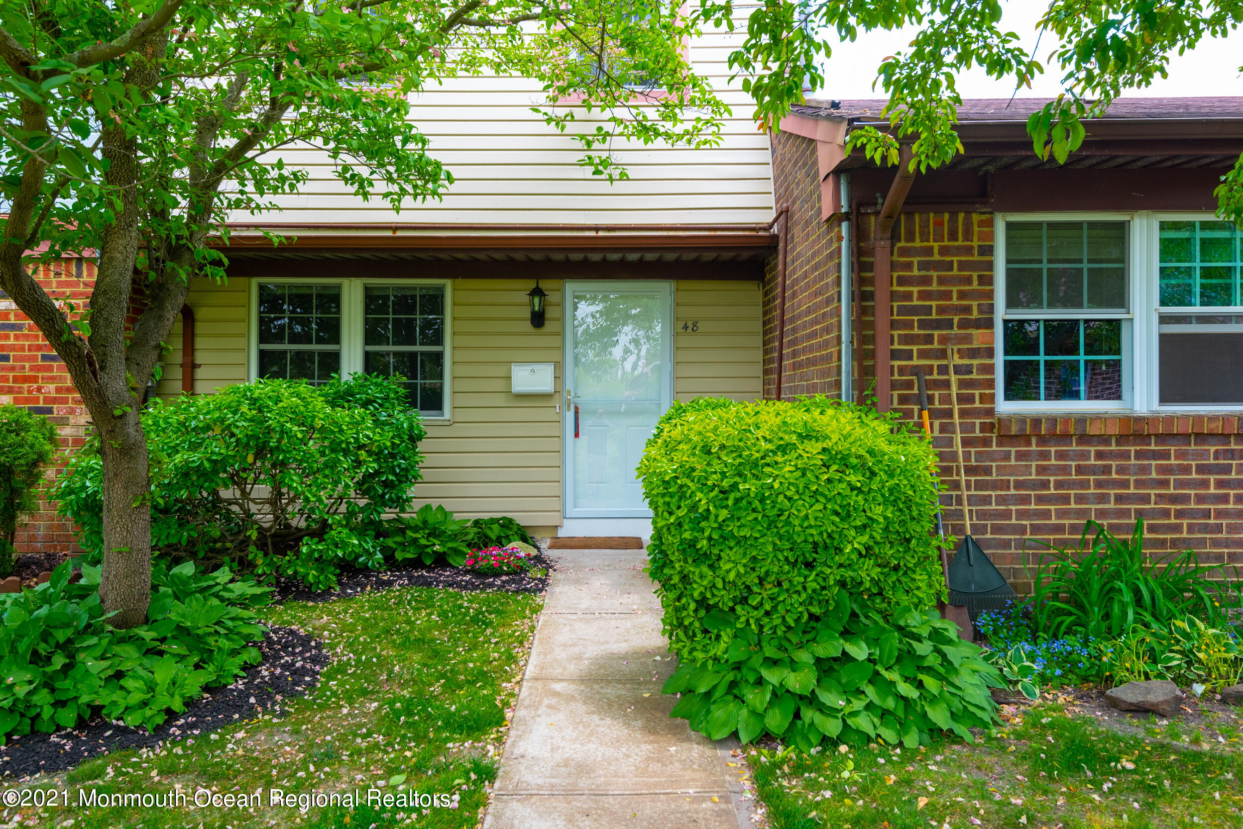 48 Greenwood Loop Road Brick, NJ 08724 - Photo 1 of 20 a view of front of a house with a yard