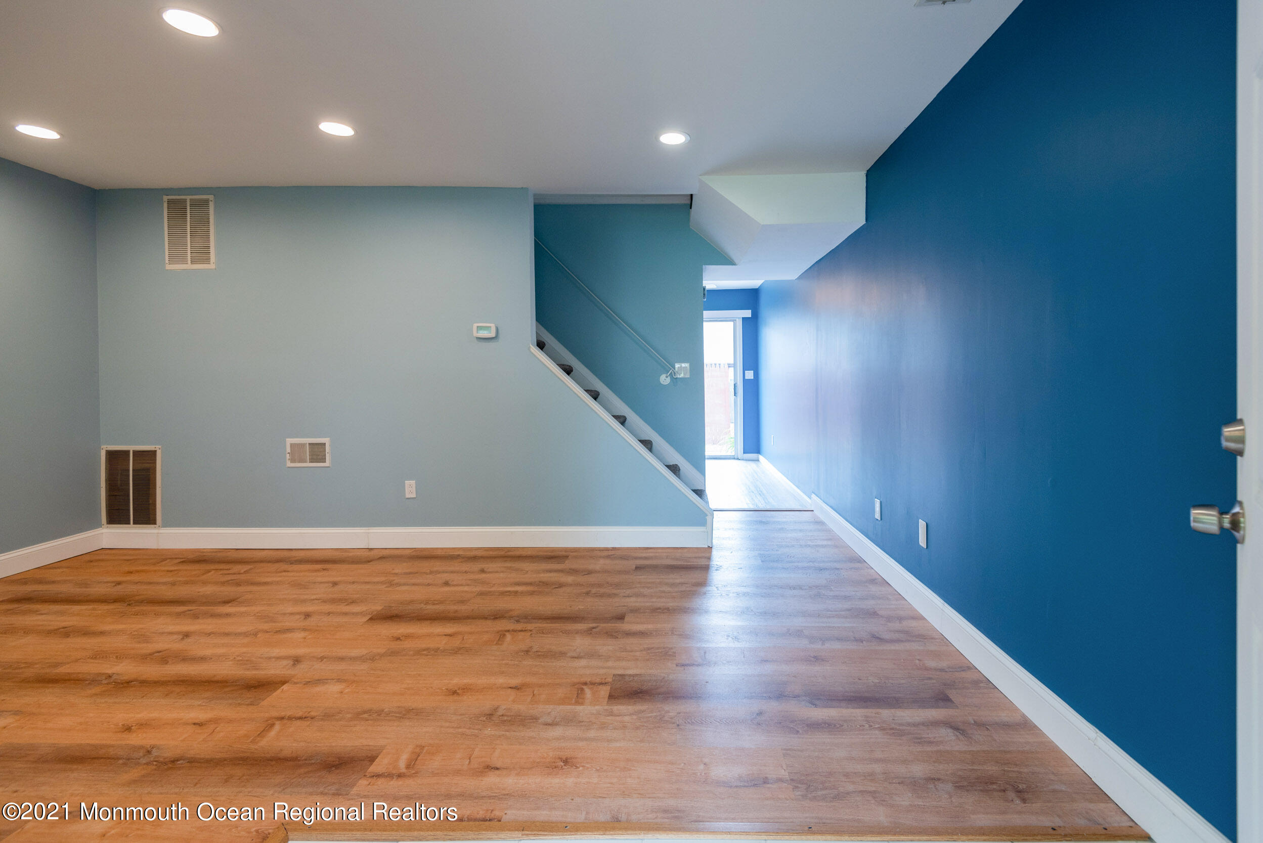 48 Greenwood Loop Road Brick, NJ 08724 - Photo 2 of 20 a view of an empty room with wooden floor