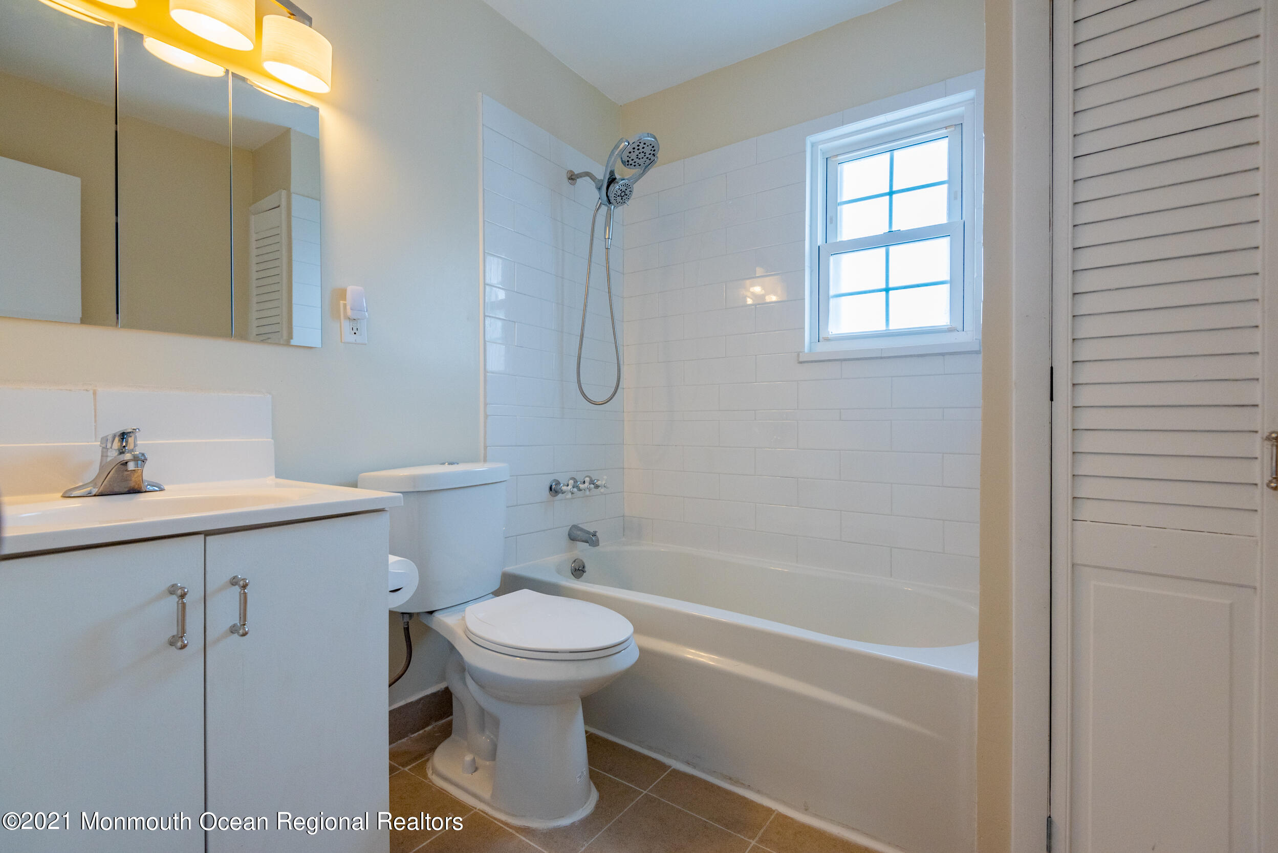48 Greenwood Loop Road Brick, NJ 08724 - Photo 15 of 20 a bathroom with a sink toilet and shower