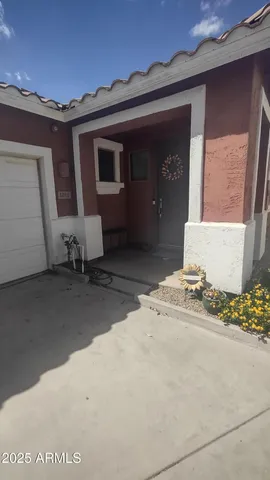 a view of a house with a garage