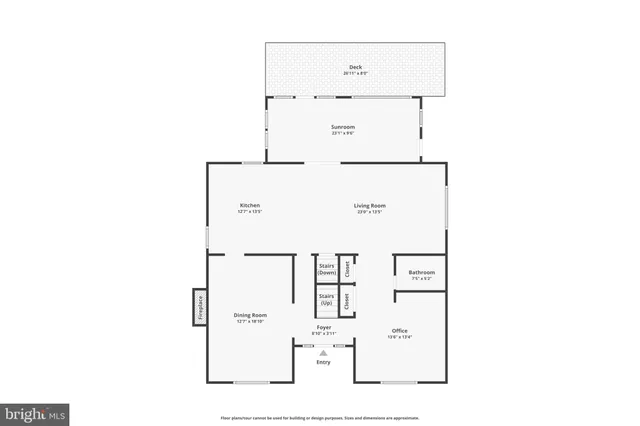 a view of a white house with large windows and a table and chairs