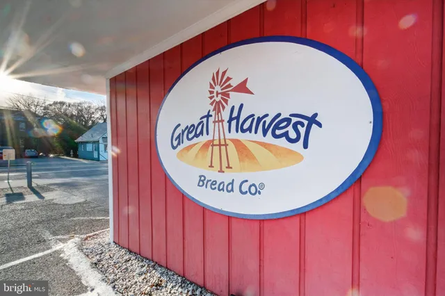 a view of a building with sitting area