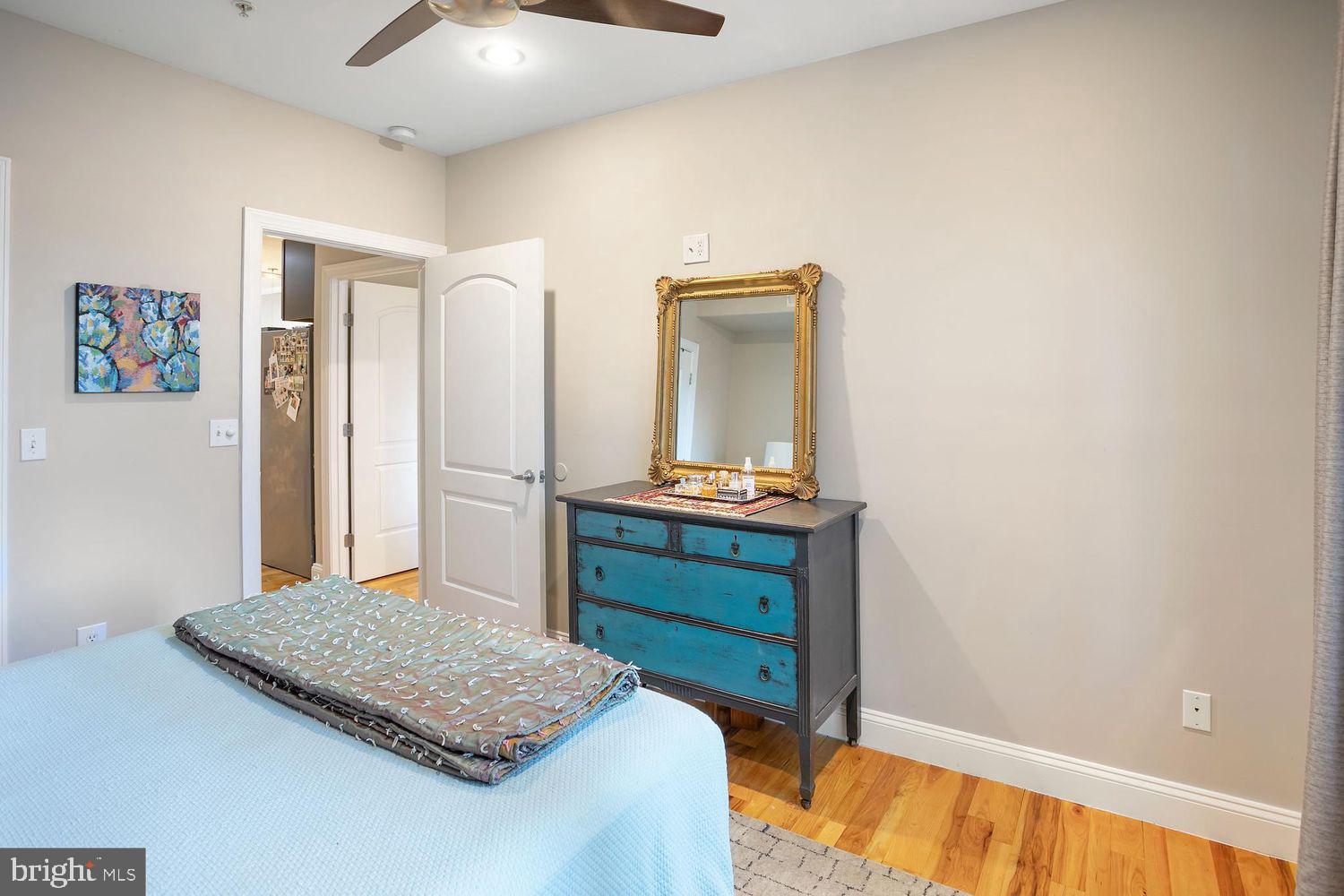 2650 15th Street Northwest, Unit 2 Washington, DC 20009 - Photo 21 of 25 a room with a bed and a dresser
