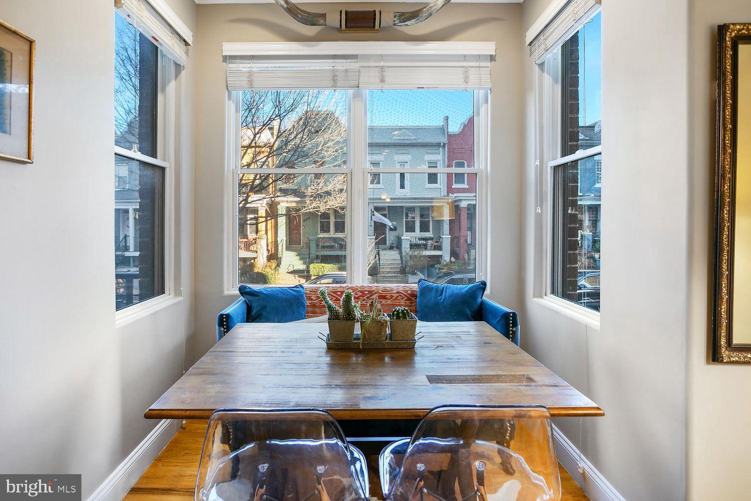 2650 15th Street Northwest, Unit 2 Washington, DC 20009 - Photo 4 of 25 a view of a dining room with furniture and window