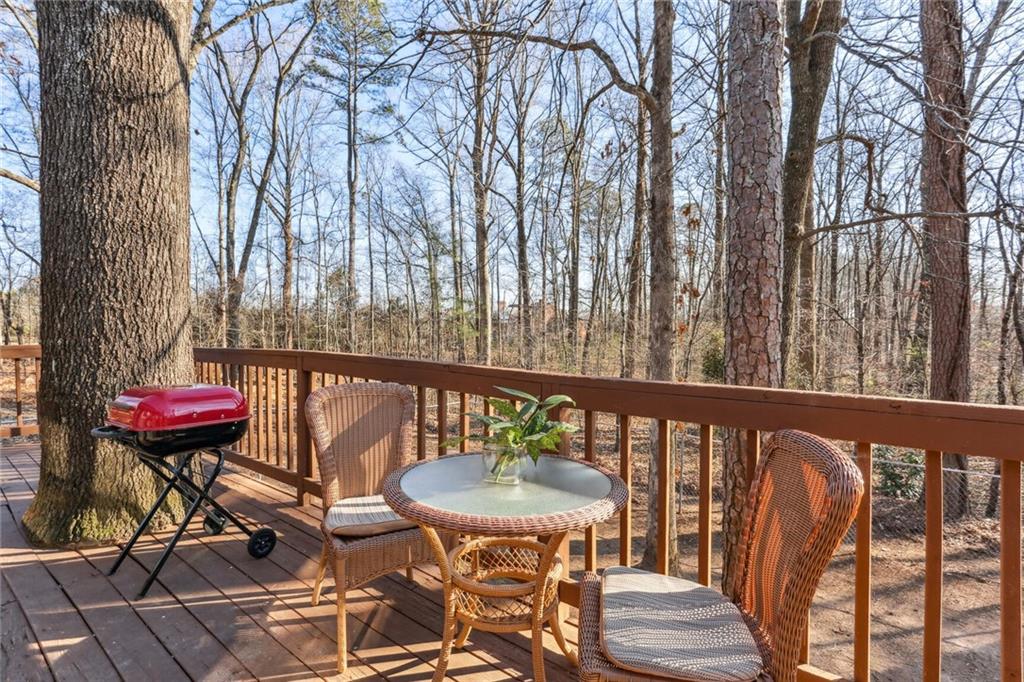 4667 Glore Road Southwest Mableton, GA 30126 - Photo 26 of 46 a view of balcony with wooden floor and outdoor seating
