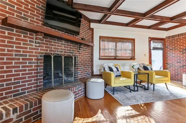 a building outdoor space with patio furniture and potted plants
