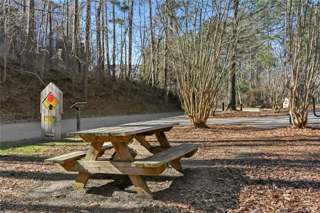 a view of a backyard with sitting area