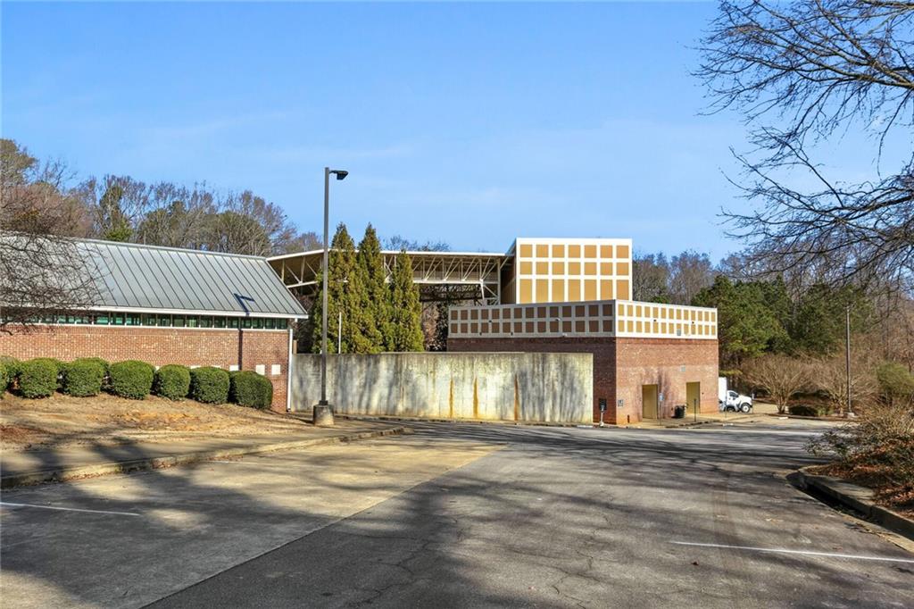 4667 Glore Road Southwest Mableton, GA 30126 - Photo 38 of 46 a view of building with a street
