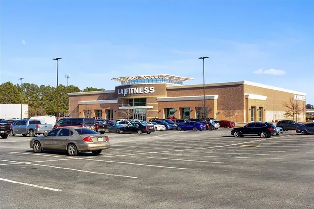 a view of a cars parked in front of a building