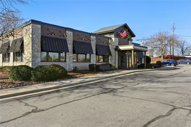 front view of a building with a street