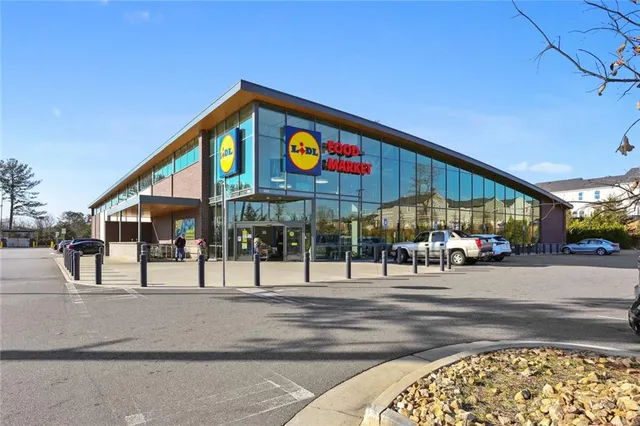 a view of a street with cars